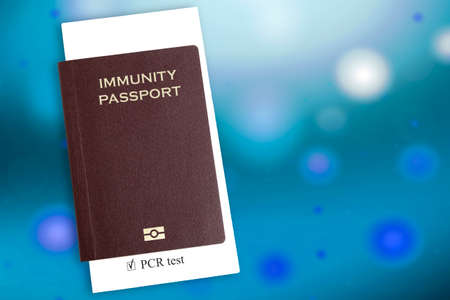 Passport with the result of the analysis for the virus. Immunity passport. PCR test in document.の写真素材