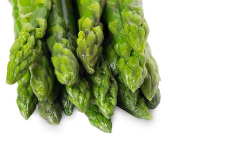 Frozen asparagus on a white plate. Healthy food.の写真素材