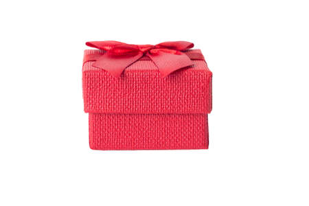 Red gift with a bow on a white background.の写真素材