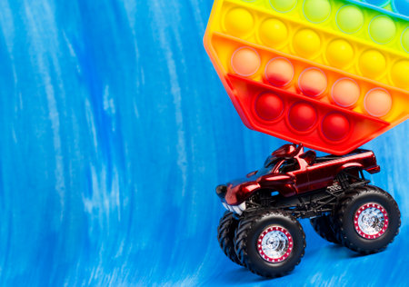 Sillicone antistress toy. The car is carrying a toy.の写真素材