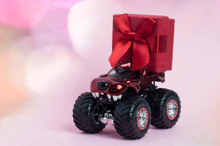 The car carries a gift with a bow.の写真素材