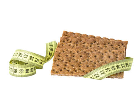 Rye crispbread isolated on white background. Diet food. Rye crispy bread with a meter.の写真素材