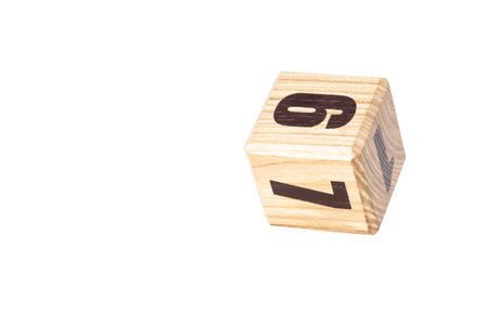Wooden cube with numbers 6, 7, 1 isolated on white background.の写真素材