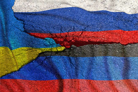Flag of Russia of the Donetsk People's Republic and Ukraine on broken asphalt.の写真素材