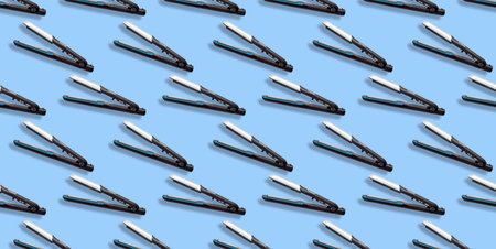 Hair straightener seamless pattern on blue background.