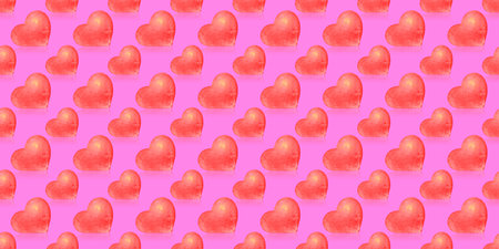 Seamless pattern with red hearts on a pink background.
