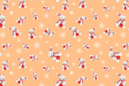 Seamless pattern with a toy bear on a beige background.の写真素材
