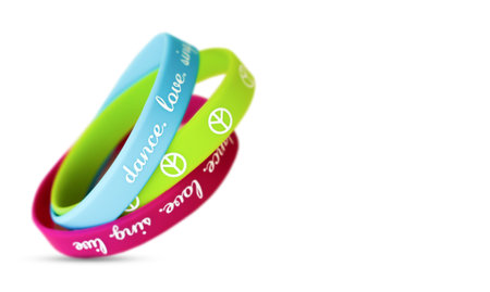 Bright bracelets with an inscription on a white background.の写真素材