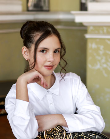 Portrait of a brunette in a white shirt.の写真素材