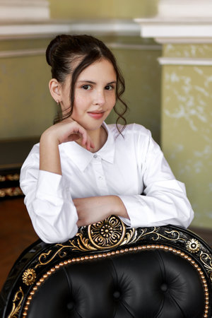 Portrait of a brunette in a white shirt.の写真素材