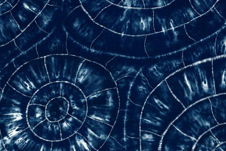 Indigo Blue Shibori Tie dye fabric texture pattern. White and Blue colors.の写真素材