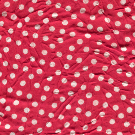 Vintage textile with polka dots. Red and white retro background.の写真素材