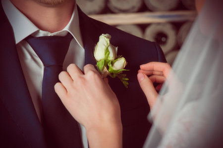 Wedding boutonniere and handsの写真素材