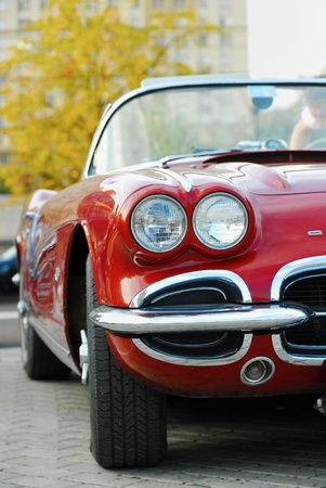 MOSCOW â JULY 31:Red Corvet front Light  on exhibition parking night rally of retro-cars âNight Moscow Classic Rally-2010âのeditorial素材