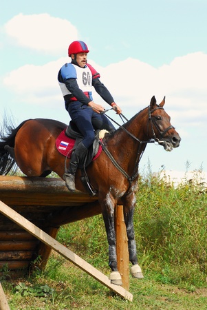 MOSCOW - AUGUST 21: Korshunov Andrey on Fabiy on a  Russian Cross-Country Championship, August 21, 2010 in Moscowのeditorial素材
