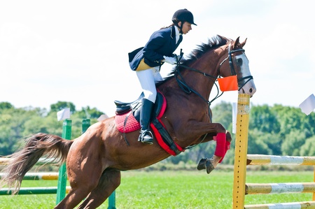 ARSENEV, RUSSIA - SEPTEMBER 03:  Unidentified rider in action rides horse show jumps at the Riding show のeditorial素材
