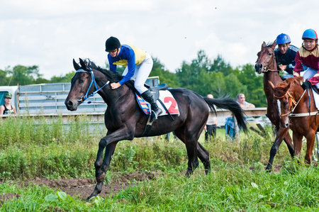 ARSENEV, RUSSIA - SEPTEMBER 03:  Unidentified riders race horses on Riding show のeditorial素材