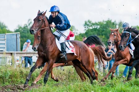 ARSENEV, RUSSIA - SEPTEMBER 03:  Unidentified riders race horses on Riding show のeditorial素材