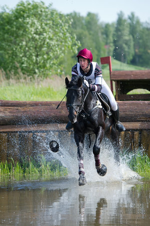 MOSCOW - JUNE 02  Unidentified rider on horse is overcomes the obstacle at the International...
