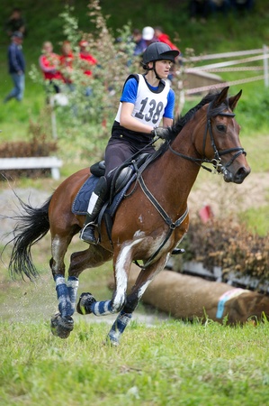 MOSCOW - JUNE 02  Unidentified rider on horse is overcomes the obstacle at the International Eventing Competition CCI3  2  1  Russian Cup Eventing June 02, 2012 in Moscow, Russiaの写真素材