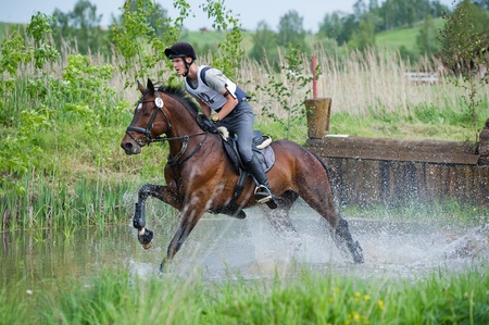 MOSCOW - JUNE 02  Unidentified rider on horse is overcomes the obstacle at the International Eventing Competition CCI3 のeditorial素材
