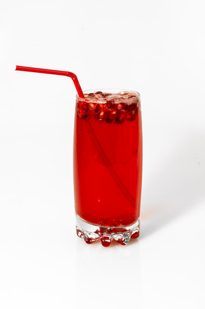 berry cooler cocktail with drinking straw in tall glassの写真素材