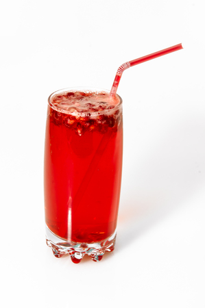 berry cooler cocktail with drinking straw in tall glassの写真素材