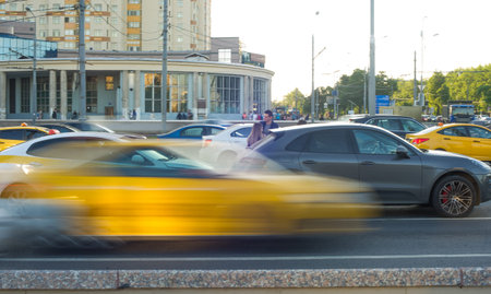 Traffic accident involving taxi and car on the road.
