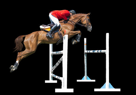 Equestrianism: Man in jumping show, isolated on black backgroundの写真素材