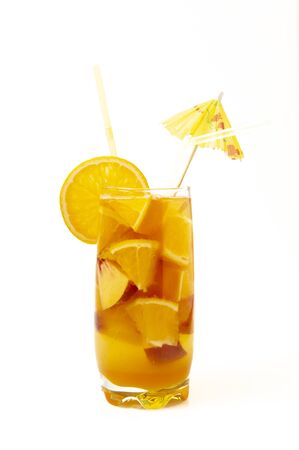 Close up orange cooler cocktail with drinking straw on white backgroundの写真素材