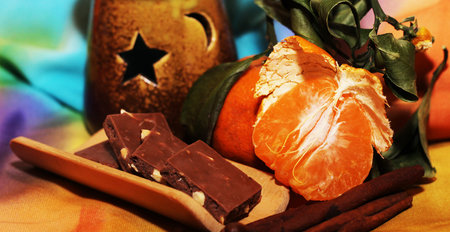 orange and cinnamon, sweet dark chocolates, happy new yearの写真素材
