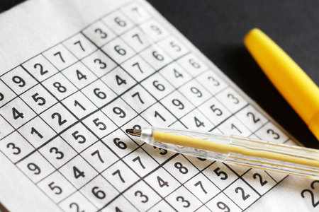 Crossword their numbers and yellow handle, educationの写真素材