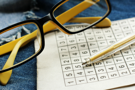 Crossword their numbers and yellow handle, educationの写真素材