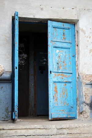 A weathered blue door on the island of Santorini, Greece, Europeの写真素材