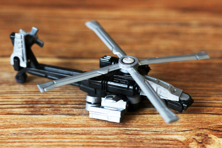 Toy Military Helicopter on wooden table, objectの写真素材