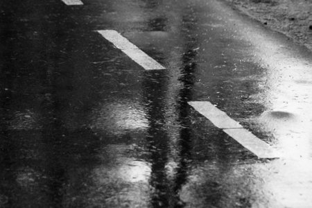 Asphalt Road Texture With Yellow Dash Strip, outdoorの写真素材