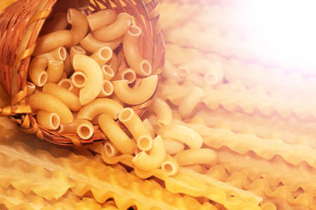 Scattered dry pasta, Italian food tasty objectの写真素材