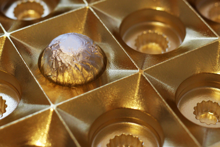 A square box of chocolatesの写真素材