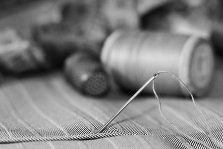 needle with thread and buttons, hobby objectの写真素材