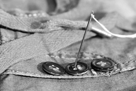 needle with thread and buttons, hobby objectの写真素材