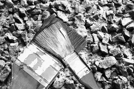 Brush to paint on the background of the stone, construction and repair, object