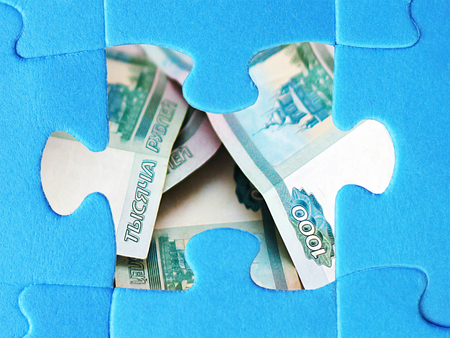 Blank white jigsaw puzzle piece, russian money, financeの写真素材