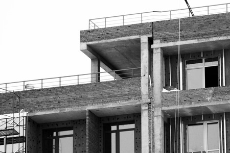 Brick House construction site. Building construction brick house. Unfinished Home Construction.の写真素材