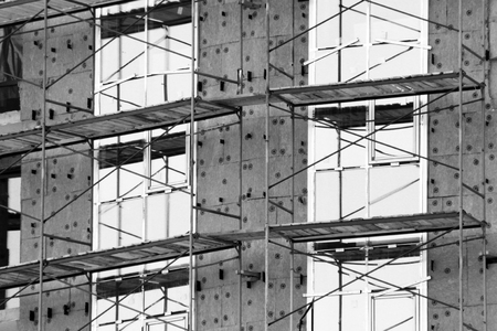 Brick House construction site. Building construction brick house. Unfinished Home Construction. Windows.の写真素材