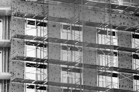 Brick House construction site. Building construction brick house. Unfinished Home Construction. Windows.の写真素材