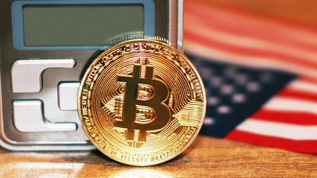 Bitcoin and the electronic scales. New cryptocurrency.の写真素材