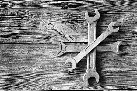 Tools for repairs on a wooden background, metalの写真素材