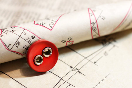 Beautiful buttons on paper pattern, sewing theme, object