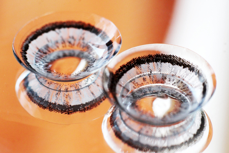 Gray contact lenses very close, macro objectの写真素材