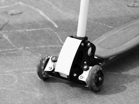 Children's scooter stands on the road. Autumn, rest, sportの写真素材